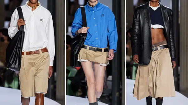 Three models showcasing avant-garde fashion shorts in a runway show.